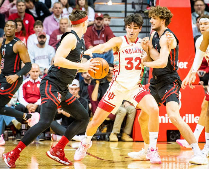 Trey Galloway (32) fights through a Rutgers' screen during the Indiana versus Rutgers game.